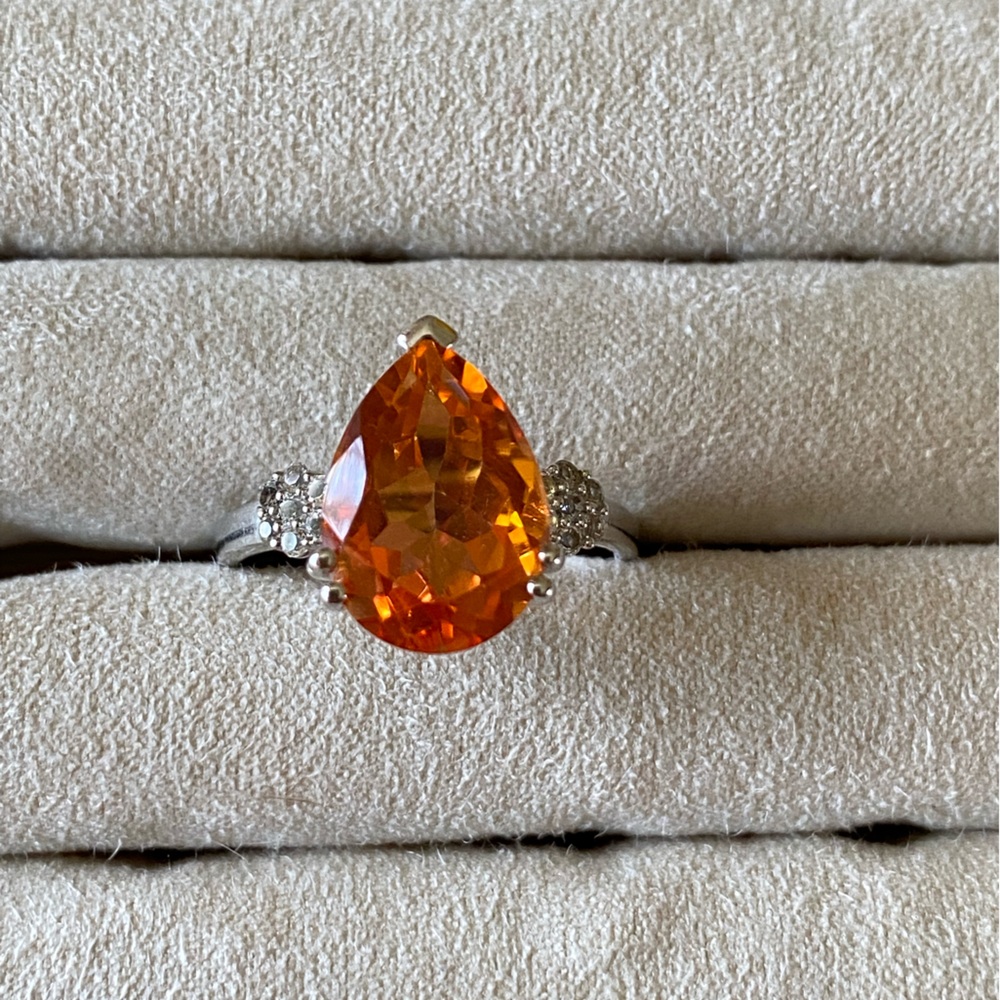 Simulated citrine teardrop stone with crystals